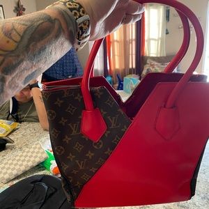 Red and brown monogram handbag